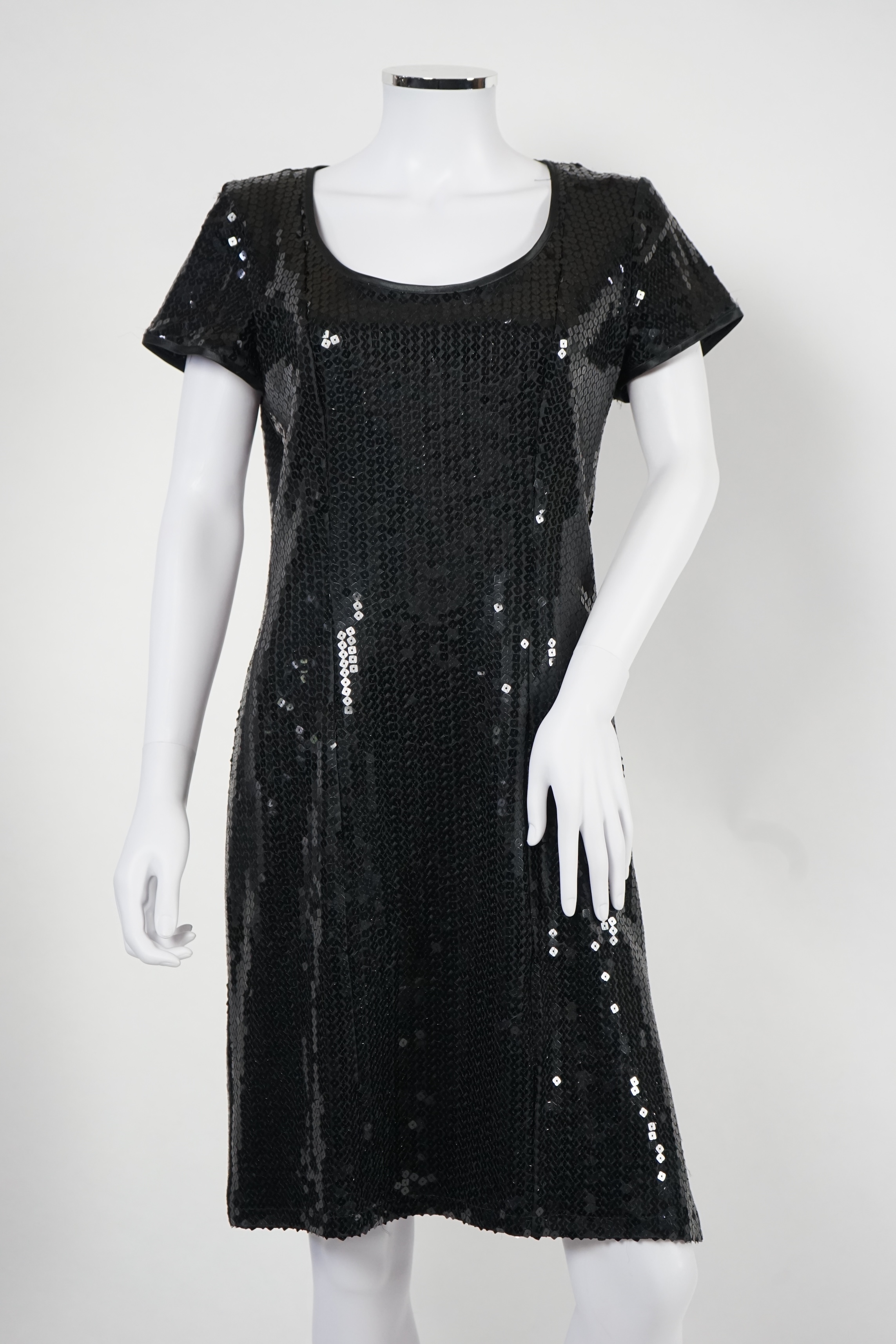 Two vintage Yves Saint Laurent variation lady's black evening dresses, F 42 (UK 14). Proceeds to Happy Paws Puppy Rescue